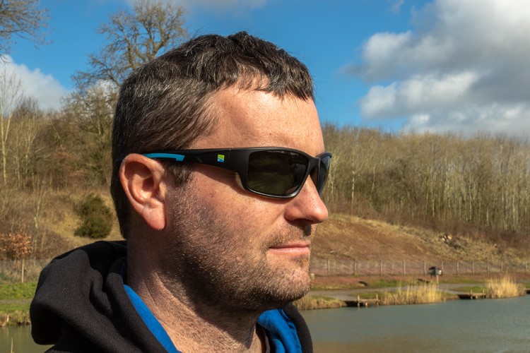 Green lense best sale sunglasses
